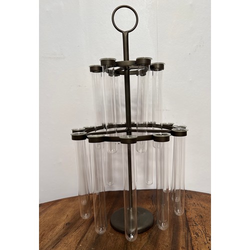 19 - Metal test tube holder complete with eighteen glass tubes  {H 50cm x Dia 30cm }.