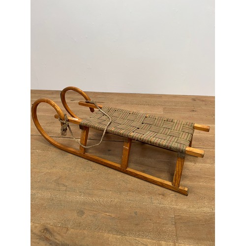 53 - 1950s winter sleigh with hessian rope  {L 129cm x H 40cm x W31cm }.