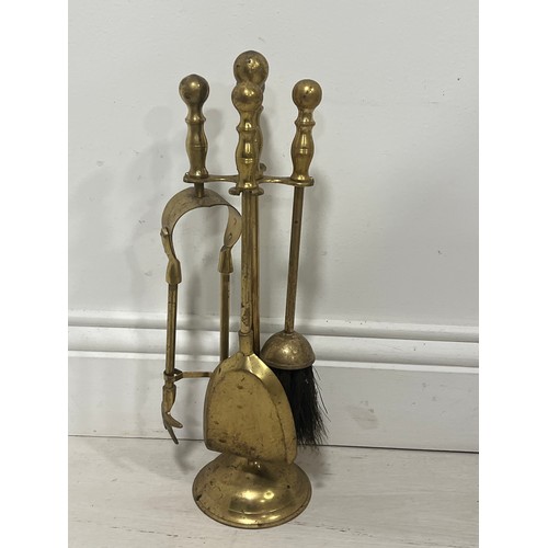 89 - Brass companion set  {H 42cm x Dia 11cm }.