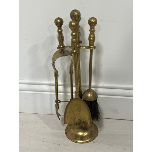 89 - Brass companion set  {H 42cm x Dia 11cm }.