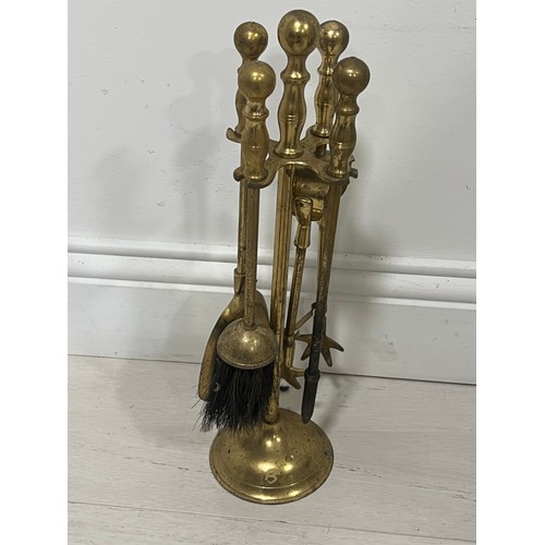 89 - Brass companion set  {H 42cm x Dia 11cm }.