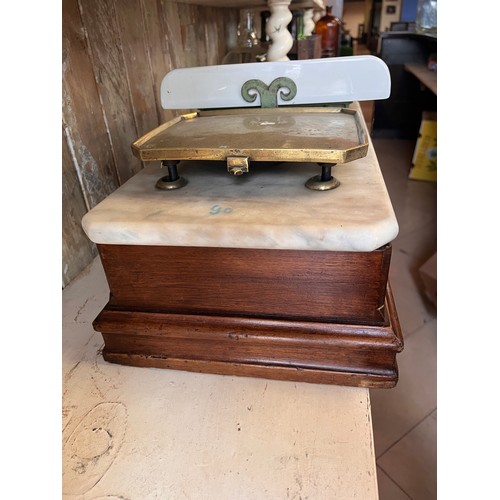 123 - Ceramic and brass scales with marble top and wooden base {H 23cm x W 53cm wide x D 27cm }.