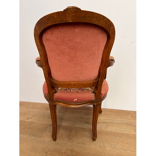 179 - French tapestry upholstered arm chair raised on cabriole legs {H 87cm x W 58cm x D 53cm }.