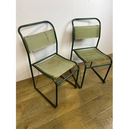 313 - Pair of green metal stacking chairs  {H 84cm x  w 44cm x d 43cm }.