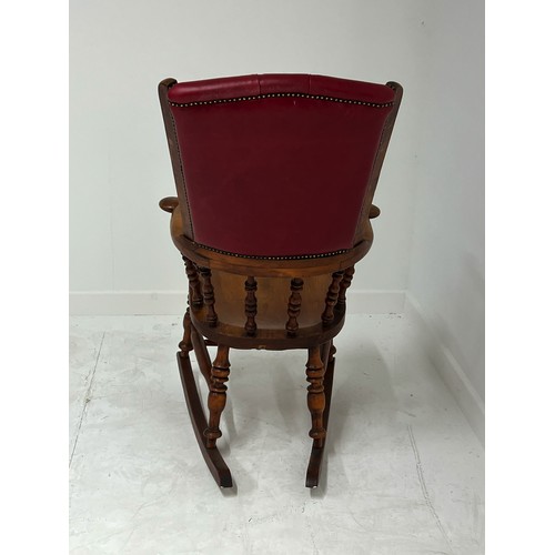 368 - Elm rocking chair with deep buttoned leather back in the Windsor style {H 107cm x W 47cm  x D 44cm }... 