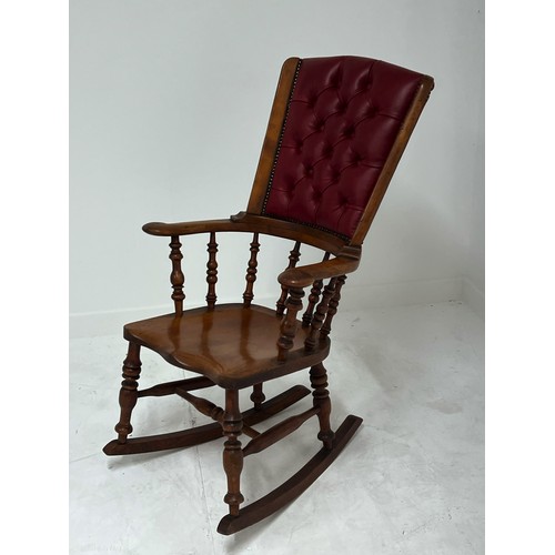 368 - Elm rocking chair with deep buttoned leather back in the Windsor style {H 107cm x W 47cm  x D 44cm }... 