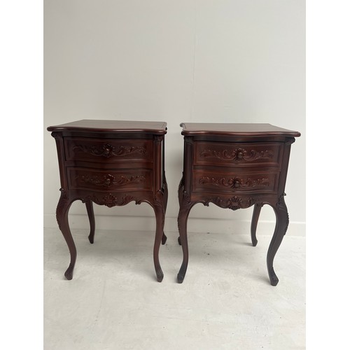 689 - Pair of mahogany bedside lockers with two drawers {H 74cm x W 50cm x D 40cm }.