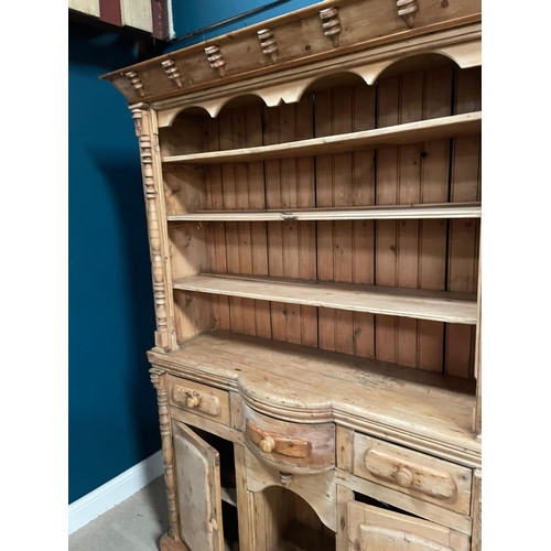 129 - 19th C. Irish Stripped pine kitchen dresser. Three drawers in the frieze above two blind doors {200c... 