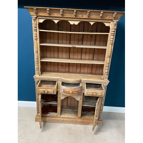 129 - 19th C. Irish Stripped pine kitchen dresser. Three drawers in the frieze above two blind doors {200c... 