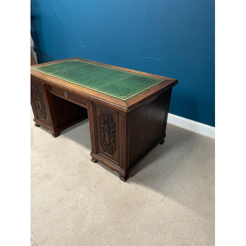 163 - Edwardian carved oak pedestal desk with inset leather top {77cm H X 160cm W x 85cm D}