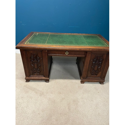 163 - Edwardian carved oak pedestal desk with inset leather top {77cm H X 160cm W x 85cm D}