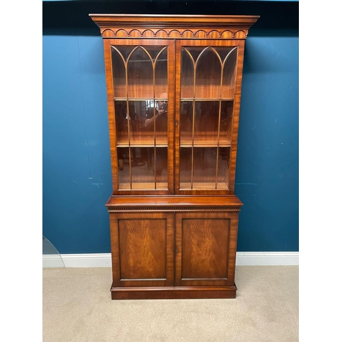 384 - Good quality mahogany two door bookcase in the Georgian style {210cm H x 110cm W x 46cm D}