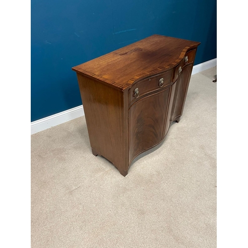 414 - Edwardian mahogany and brass inlaid serpentine front side cabinet with two drawers in the frieze abo... 