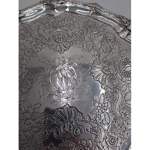 1344 - Irish silver salver, the rim decorated with an applied scroll border, the surface decorated with thr... 