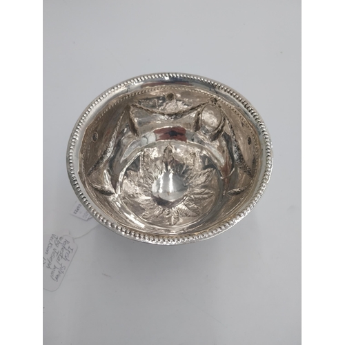 1349 - Irish silver pedestal bowl, the rim decorated with punch work beading, the body embossed with swags ... 