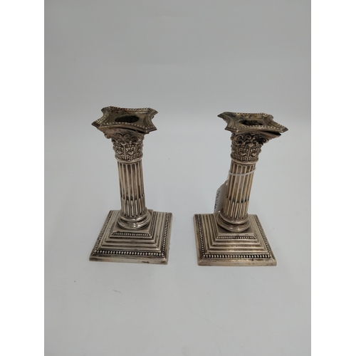 1365 - Pair of English packed silver Corinthian column candlesticks. Hallmarked in Sheffield. Maker's mark ... 