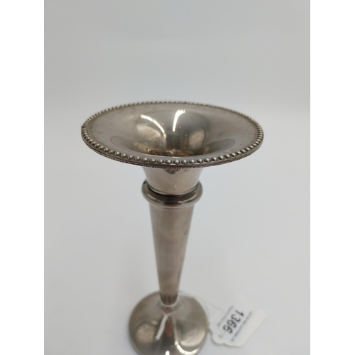 1366 - Silver plated bud vase, the tapered plain body with gadroon rim and flat base.