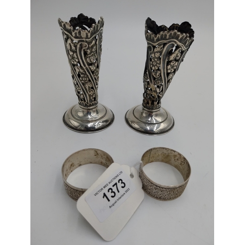 1373 - Three English silver napkin rings. Hallmarked in Birmingham 1902. Makers mark unclear Wt: 54grs. { 2... 