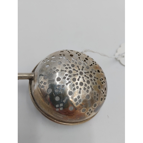 1374 - English silver tea strainer. Hallmarked in Birmingham 1918. Maker T H Hazelwood & Co. Wt: 24grs. { 1... 