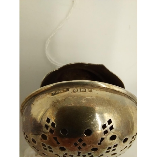 1374 - English silver tea strainer. Hallmarked in Birmingham 1918. Maker T H Hazelwood & Co. Wt: 24grs. { 1... 