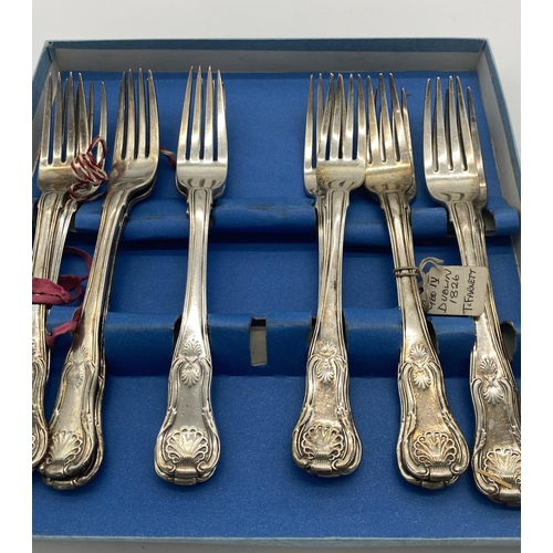 1384 - Set of twelve Irish silver Kings Pattern dinner forks. Hallmarked in Dublin 1826 Maker T. Farnett In... 