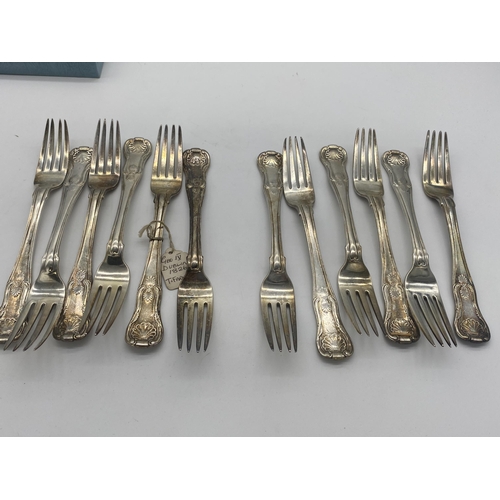 1384 - Set of twelve Irish silver Kings Pattern dinner forks. Hallmarked in Dublin 1826 Maker T. Farnett In... 