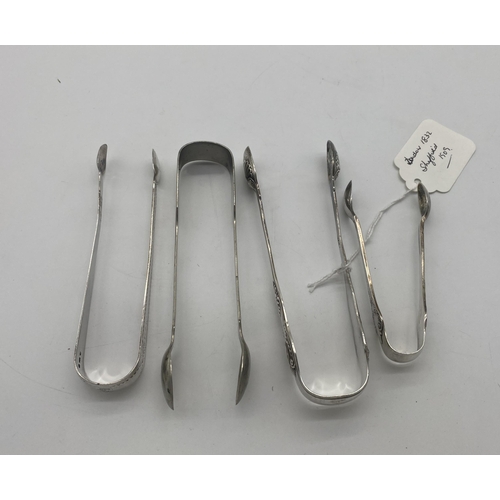 1386 - Two English silver sugar tongs. Hallmarked in London 1832 & Sheffield 1909. Wt: 90grs. { 15cm L & 11... 