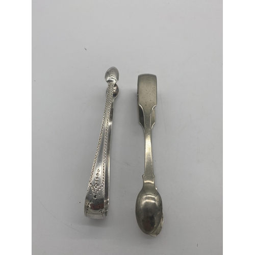 1386 - Two English silver sugar tongs. Hallmarked in London 1832 & Sheffield 1909. Wt: 90grs. { 15cm L & 11... 