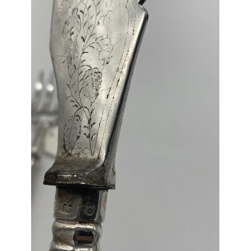 1396 - Kings Pattern fish knife and fork serving set with English silver handles. Hallmarked in Sheffield M... 