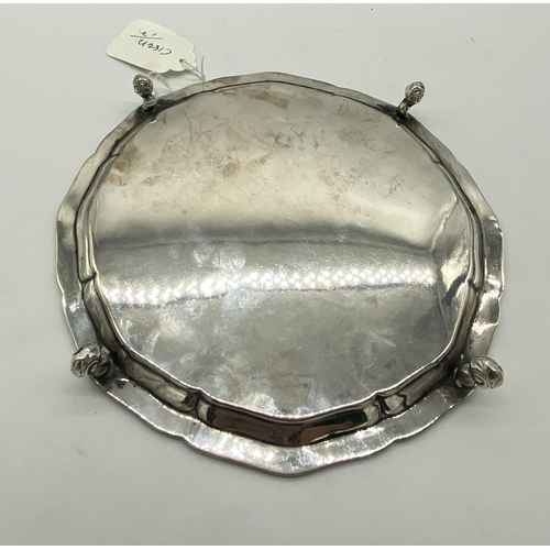 1397 - English silver salver. Hallmarked in Sheffield. 1911. Maker Robert F Mosely Wt: 210grs. { 2cm H X 20... 