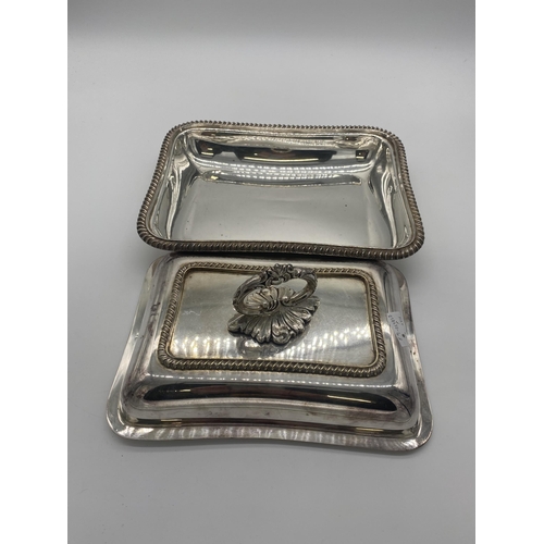 1423 - Pair of silver plated lidded entr�e dishes. Stamped Weir & Sons Dublin & Belfast. { 17cm H X 27cm W ... 