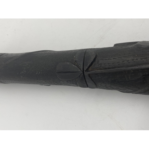 1432 - Hand carved bog oak truncheon decorated with shamrocks, harp and diamond design and engraved From Be... 