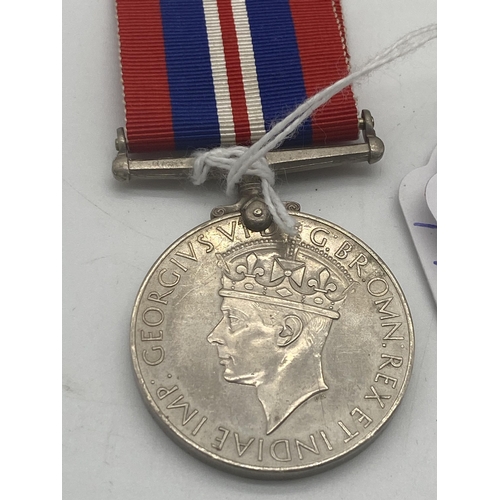 1436 - World War II Defence Medal and War Medal with ribbons.