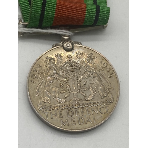 1436 - World War II Defence Medal and War Medal with ribbons.