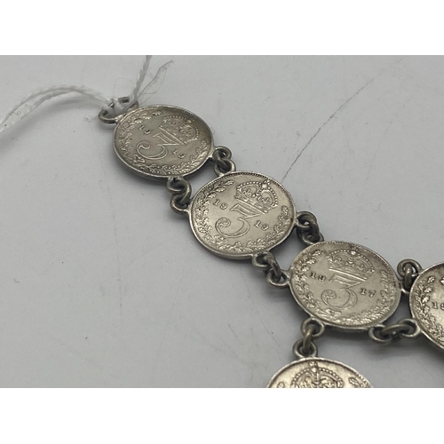 1455 - Ladies bracelet made from sixteen  George V & one Victorian 3d. pieces.