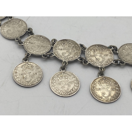 1455 - Ladies bracelet made from sixteen  George V & one Victorian 3d. pieces.