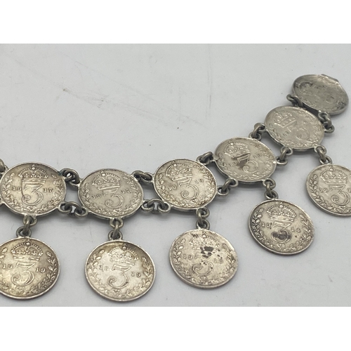 1455 - Ladies bracelet made from sixteen  George V & one Victorian 3d. pieces.