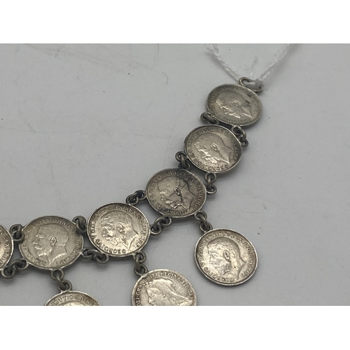 1455 - Ladies bracelet made from sixteen  George V & one Victorian 3d. pieces.