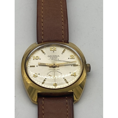 1457 - Oriosa Gent's wrist watch with leather strap, in original presentation case .