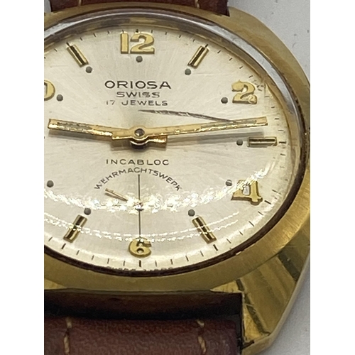 1457 - Oriosa Gent's wrist watch with leather strap, in original presentation case .