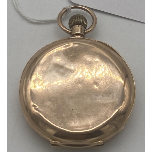 1473 - 9ct. Gents gold open face pocket watch, the enamel face with Roman numerals. { 5cm Dia }.