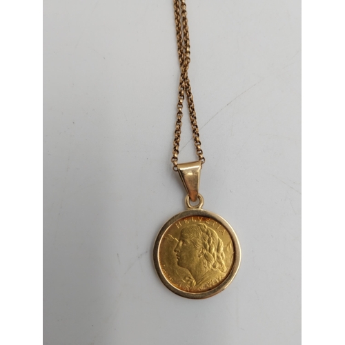 1477 - 1922 Gold Swiss 10 francs piece set in a 14 carat gold pendant setting with chain. Obverse: On the o... 