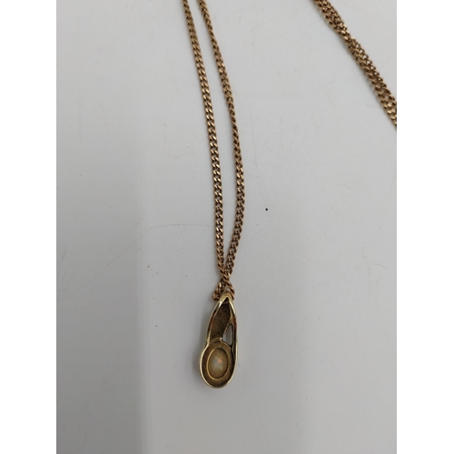 1487 - Gold chain and pendant, the pedant inset with an opal.