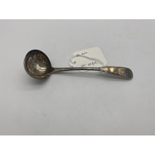 1406 - Scottish silver sauce ladle. Hallmarked with a Thistle . Makers Mark A W. Wt: 25grs. { 15cm L }.