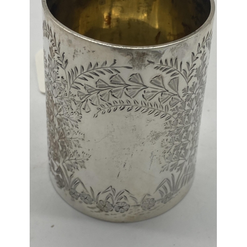 1408 - English silver mug decorated with foliage. Hallmarked in London 1884. Maker George Maudsley Jackson.... 