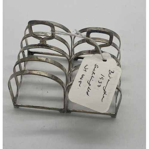 1409 - Pair of English silver toast racks Hallmarked in Birmingham 1937 Maker Suckling Ltd. Wt: 128grs. { 9... 