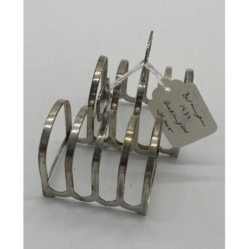 1409 - Pair of English silver toast racks Hallmarked in Birmingham 1937 Maker Suckling Ltd. Wt: 128grs. { 9... 