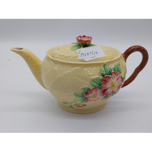 68 - CarletonWare tea pot { damaged }. { 14cm H X 21cm W X 11cm D }.