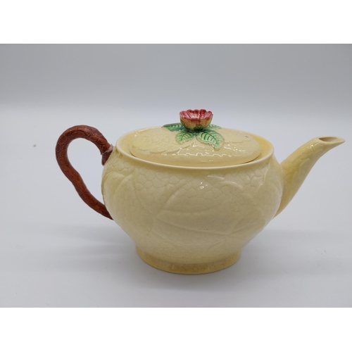 68 - CarletonWare tea pot { damaged }. { 14cm H X 21cm W X 11cm D }.