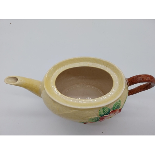 68 - CarletonWare tea pot { damaged }. { 14cm H X 21cm W X 11cm D }.